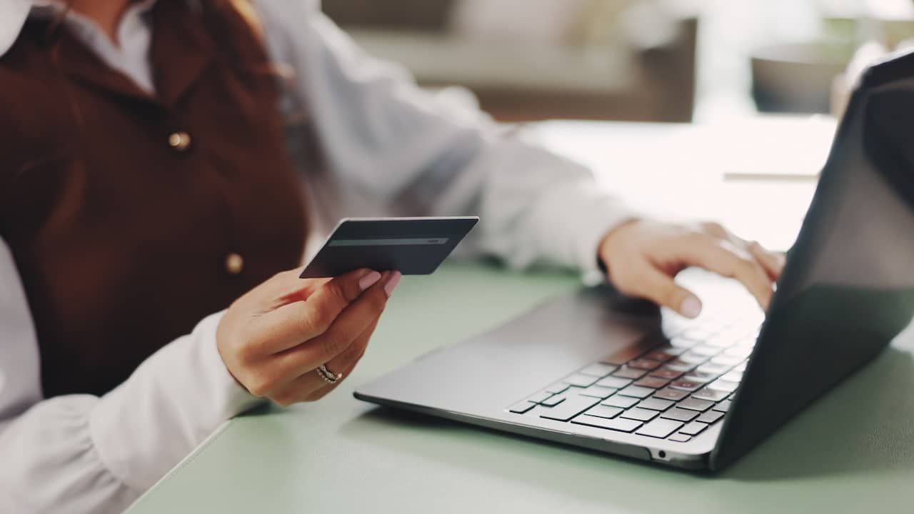 laptop and credit card for payment