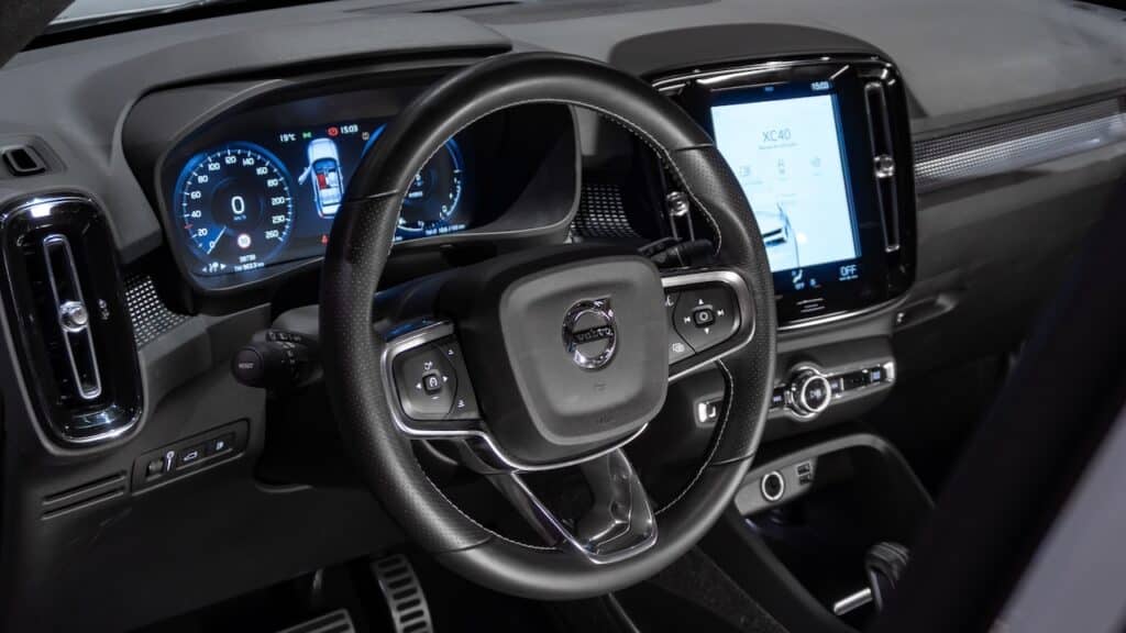 Volvo XC40 interior cockpit view, Luxury SUV dashboard and steering wheel