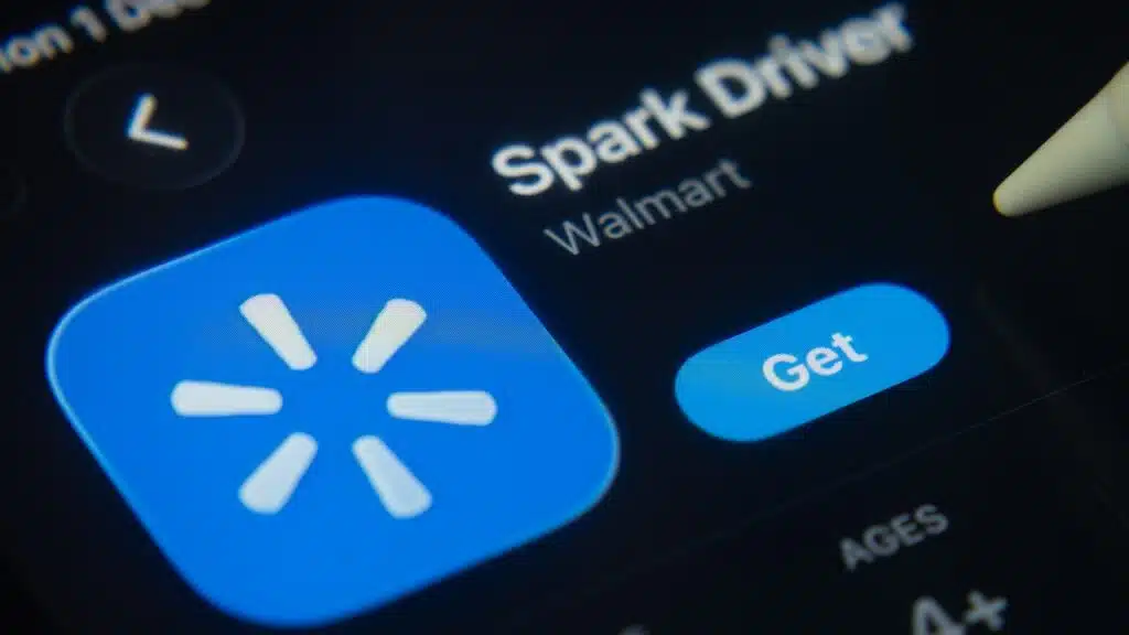 A close-up of the Walmart Spark Driver app icon in the App Store on an iPad screen.