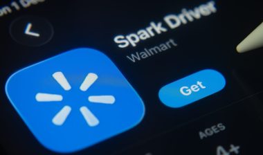 A close-up of the Walmart Spark Driver app icon in the App Store on an iPad screen.