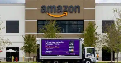 Amazon fulfillment center front entrance with MetroPCS truck in Florida
