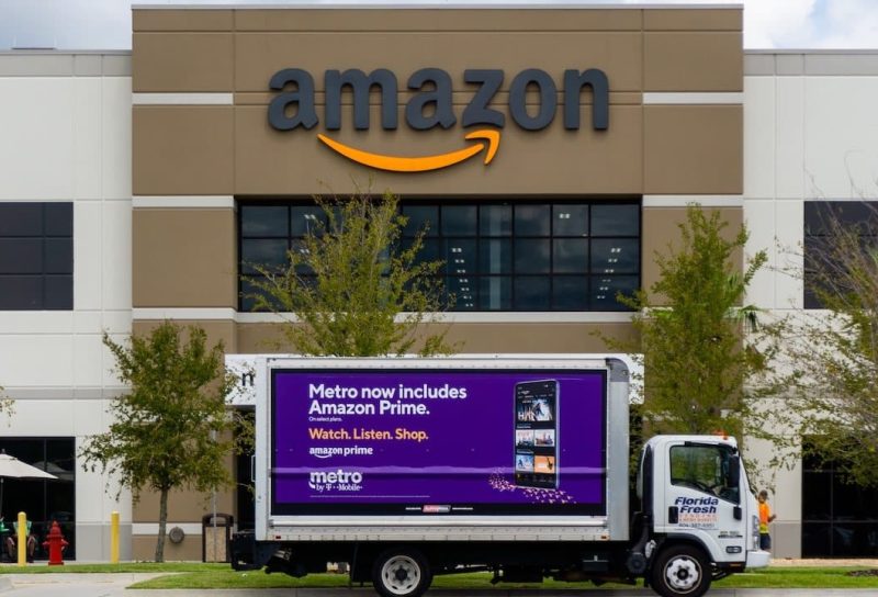 Amazon fulfillment center front entrance with MetroPCS truck in Florida