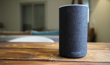 Dark grey Black Amazon Alexa Echo in a living room