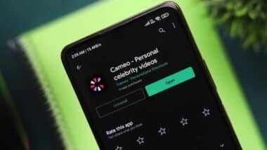 Cameo logo on phone screen stock image.