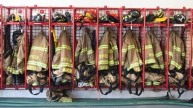 Fire gear and coats on rack