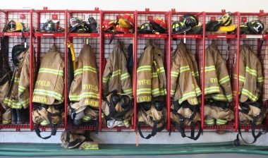 Fire gear and coats on rack