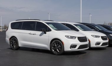 Chrysler Pacifica Limited minivan display at a dealership.