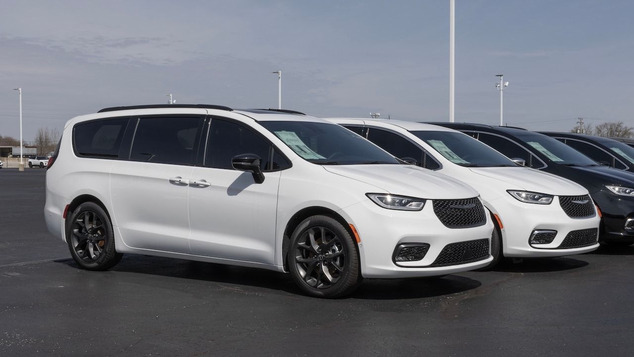 Chrysler Pacifica Limited minivan display at a dealership.