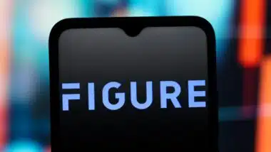the Figure Technology Solutions logo is seen displayed on a smartphone screen