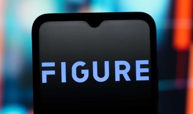 the Figure Technology Solutions logo is seen displayed on a smartphone screen