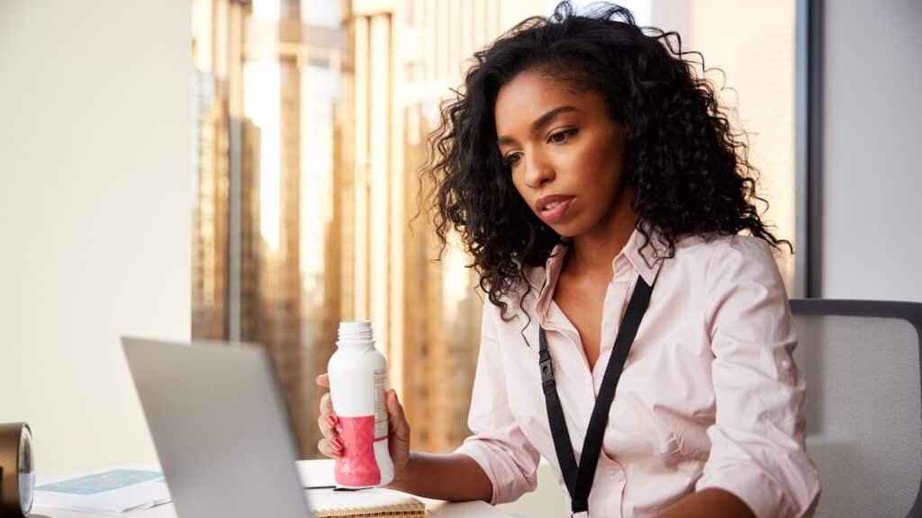 business woman drinking protein shake for breakfast