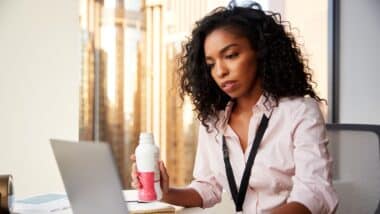 business woman drinking protein shake for breakfast