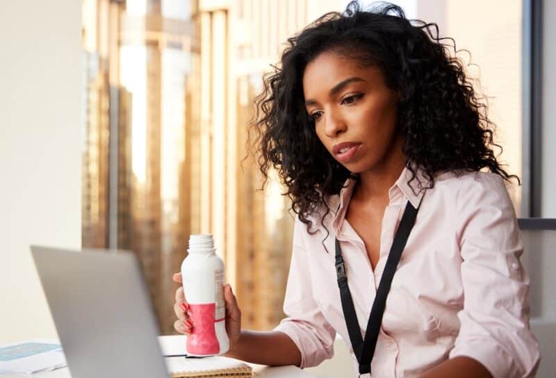 business woman drinking protein shake for breakfast