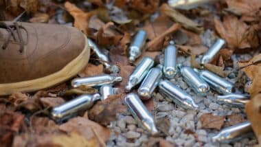 Whipped cream chargers with laughing gas thrown away after use as a cheap, but dangerous, recreational drug.