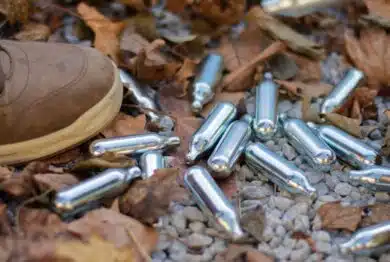 Whipped cream chargers with laughing gas thrown away after use as a cheap, but dangerous, recreational drug.