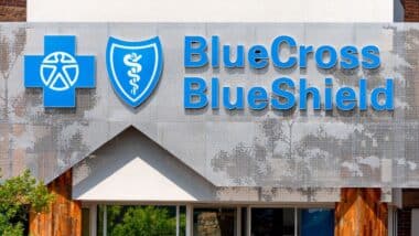 BlueCross BlueShield medical clinic exterior and trademark logo.