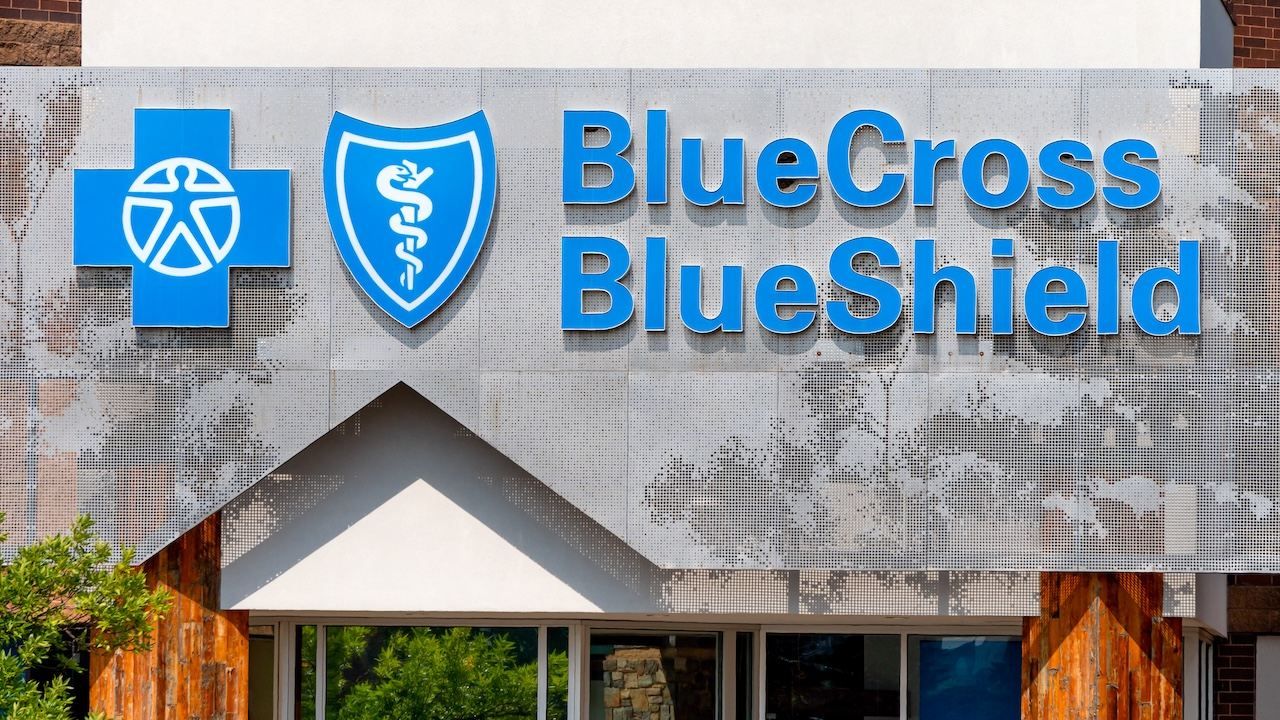 BlueCross BlueShield medical clinic exterior and trademark logo.
