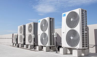 Air conditioning (HVAC) installed on the roof of industrial buildings.