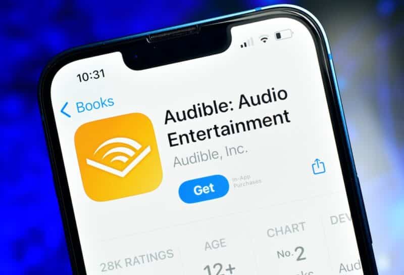 Audible app on smartphone used to listen audio content like podcast stories