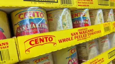 Cans of Cento San Marzano Whole Peeled Tomatoes on Shelf at Costco