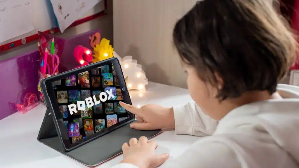 Little girl playing Roblox