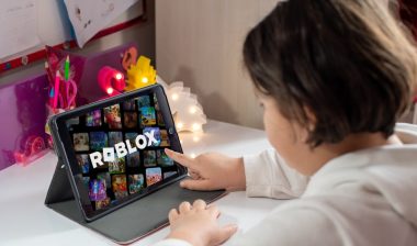Little girl playing Roblox