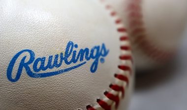Closeup View of Rawlings Company Signature on Bright New Baseball.