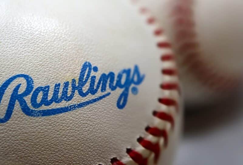 Closeup View of Rawlings Company Signature on Bright New Baseball.