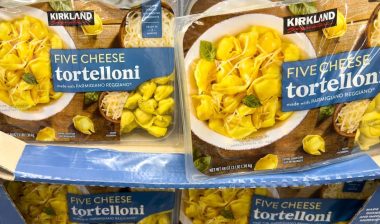 Kirkland Signature Five Cheese Tortelloni containers stacked on display in Costco Wholesale warehouse store