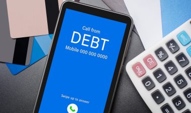Top view of incoming call on smart phone screen from Creditor.