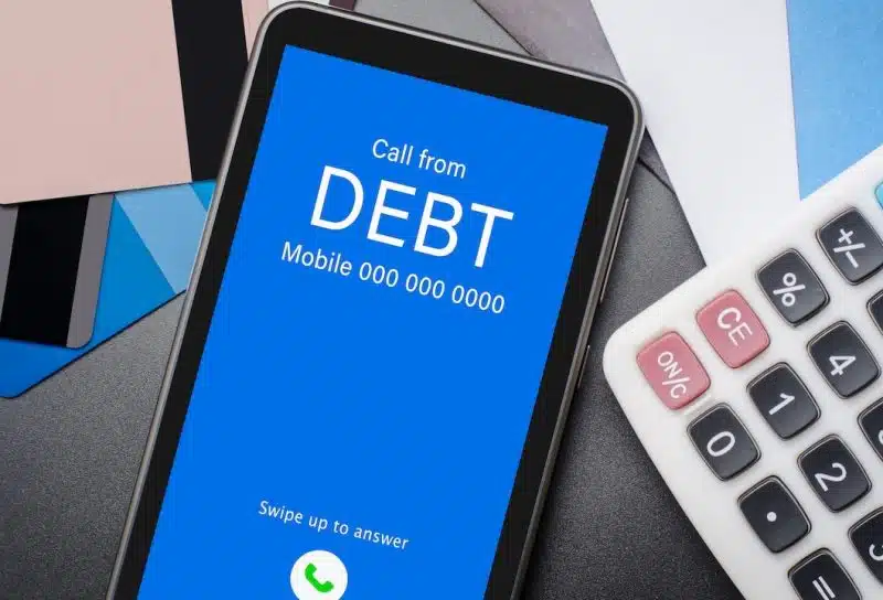 Top view of incoming call on smart phone screen from Creditor.