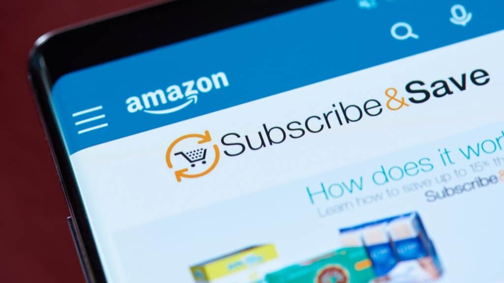 Amazon subscribe and save menu on smartphone screen close up view