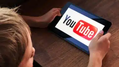Boy watching Youtube kids on tablet
