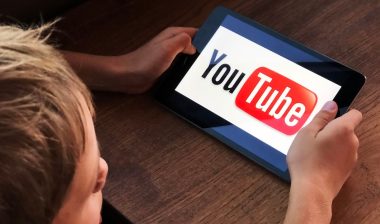 Boy watching Youtube kids on tablet
