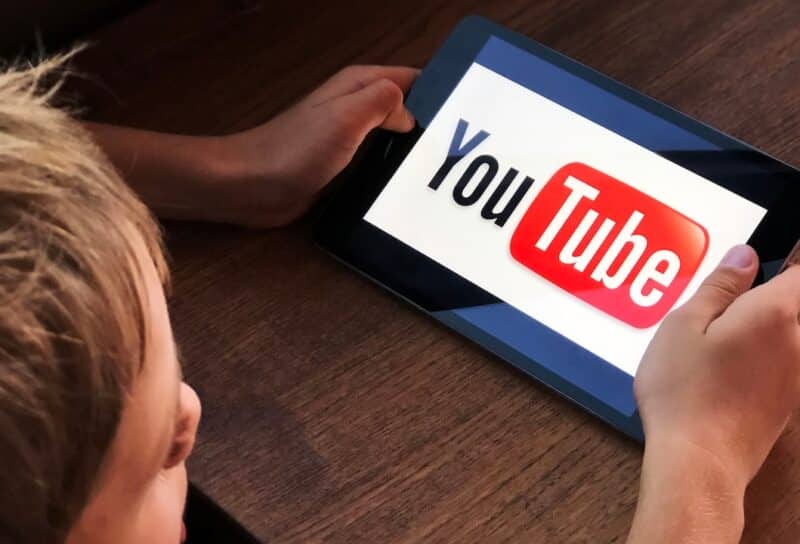Boy watching Youtube kids on tablet