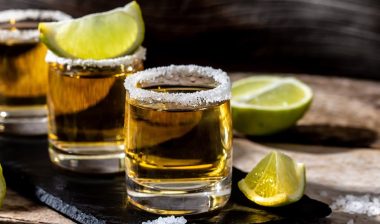 shots of gold Mexican tequila with lime and salt.