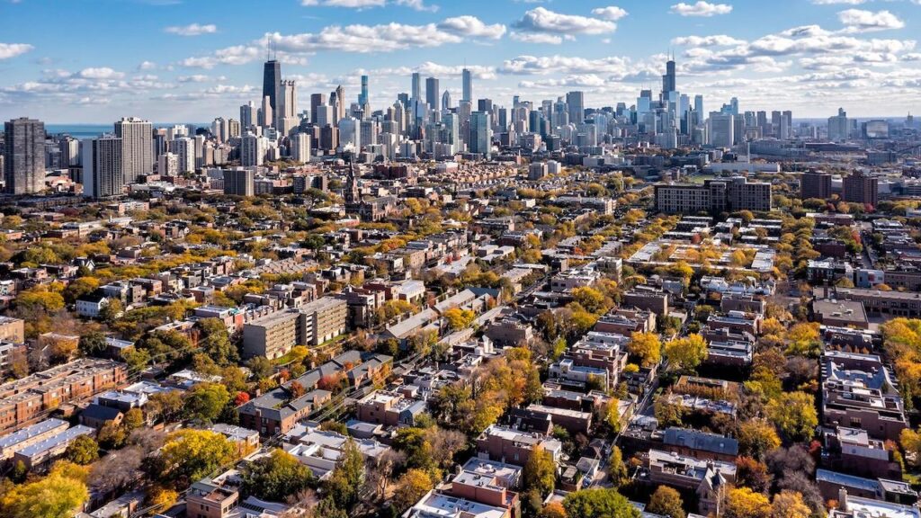 Chicago neighborhood buildings and city skyline panorama with skyscrapers on sunny autumn day