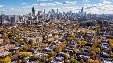Chicago neighborhood buildings and city skyline panorama with skyscrapers on sunny autumn day