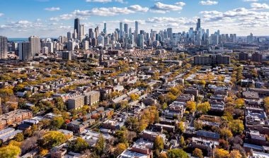Chicago neighborhood buildings and city skyline panorama with skyscrapers on sunny autumn day