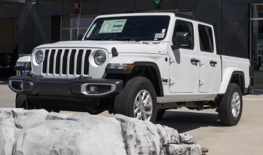 Jeep Gladiator Sport 4X4 display at a dealership.