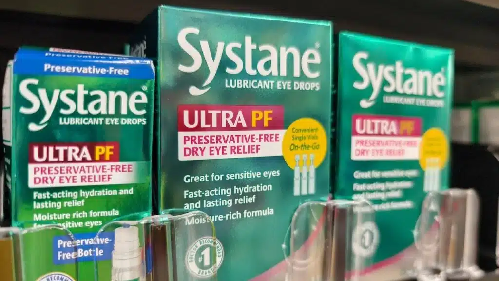 Display of Systane Lubricant Eye Drops on a Shelf in a Supermarket.