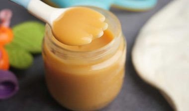 baby food in a container on table .