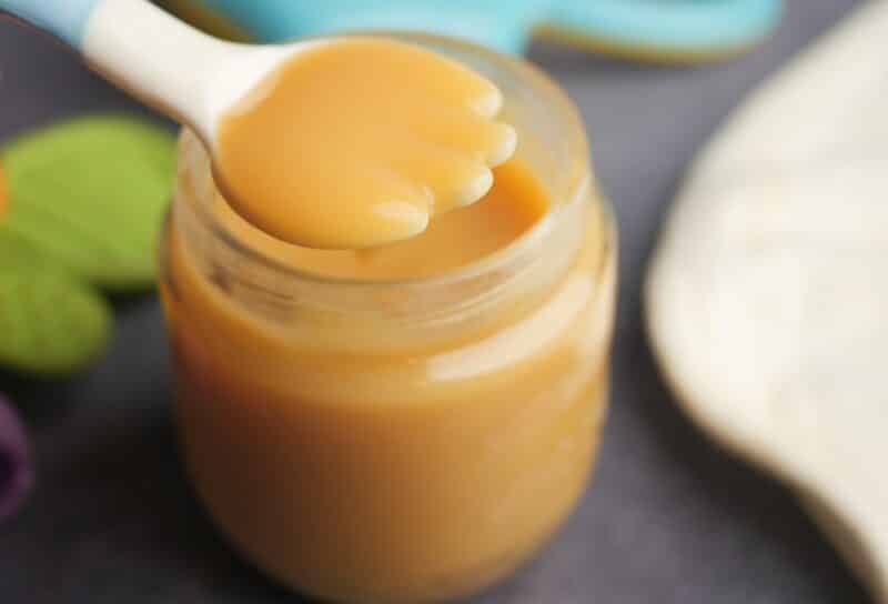 baby food in a container on table .