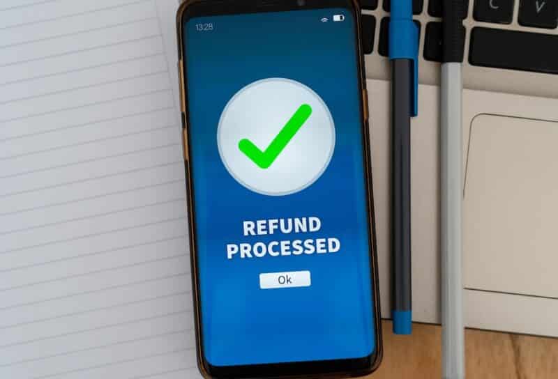 Successful refund process notification on smartphone app.