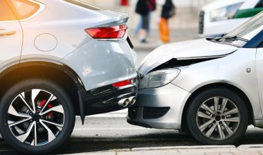 Rear end collision between two cars on urban street