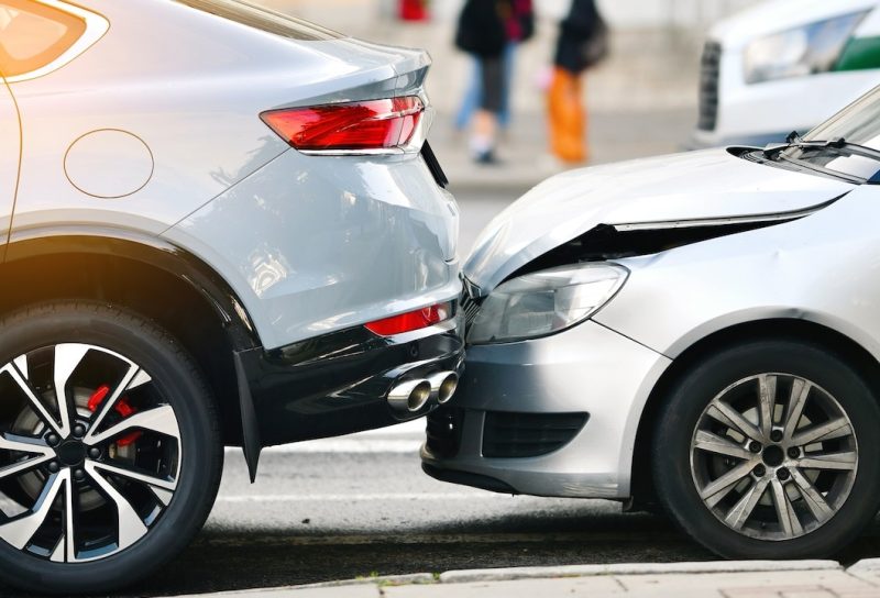 Rear end collision between two cars on urban street