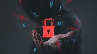 Cybersecurity breach concept with broken padlock and binary code over hooded hacker background, symbolizing data breach