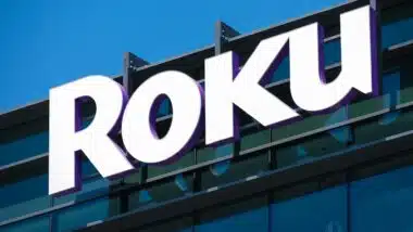 Roku sign and logo on facade of consumer electronics and broadcast media company headquarters in Silicon Valley