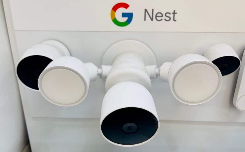 Google Nest flood light with camera on display inside a big box store.