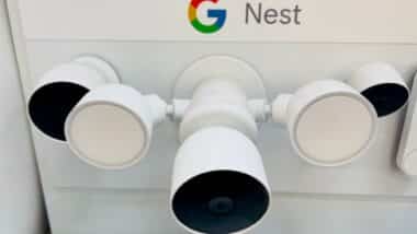 Google Nest flood light with camera on display inside a big box store.